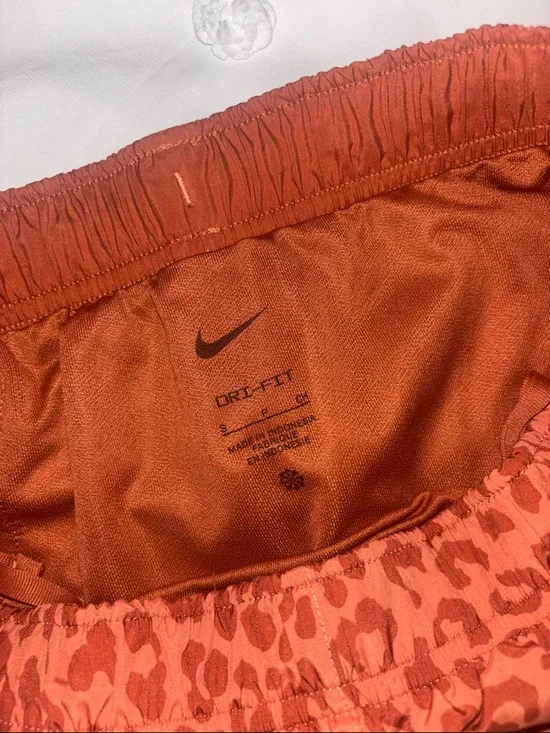 Nike Women’s Orange Leopard Print Running Shorts - Picture 2 of 3